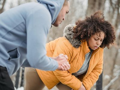 Blurred motion of hands during a stretching exercise.