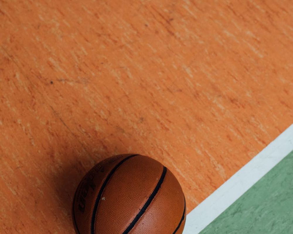 Close up of sports equipment on a clean studio floor.